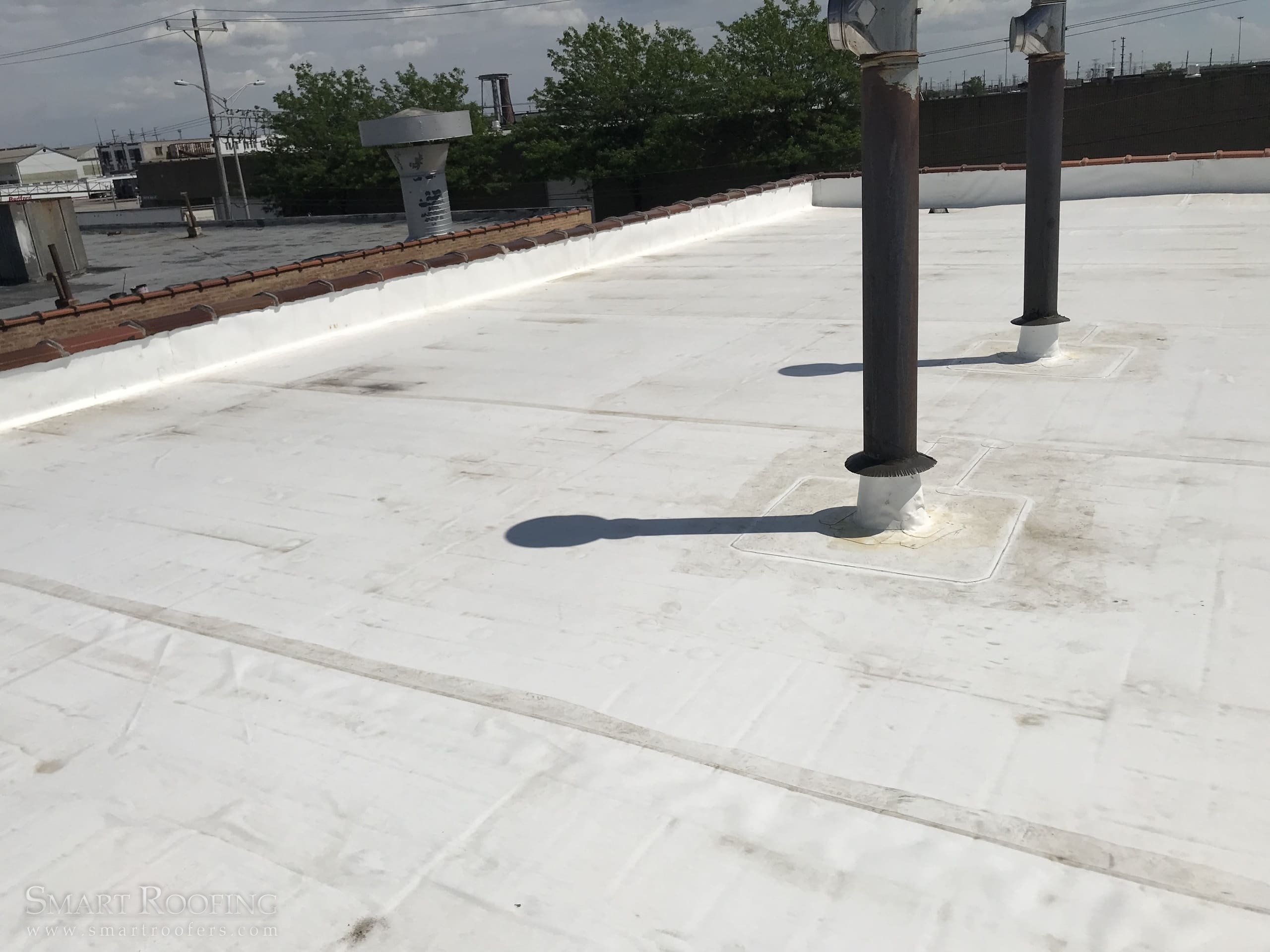 Completed TPO roof on a commercial building | Nansemond River Roofing & Siding