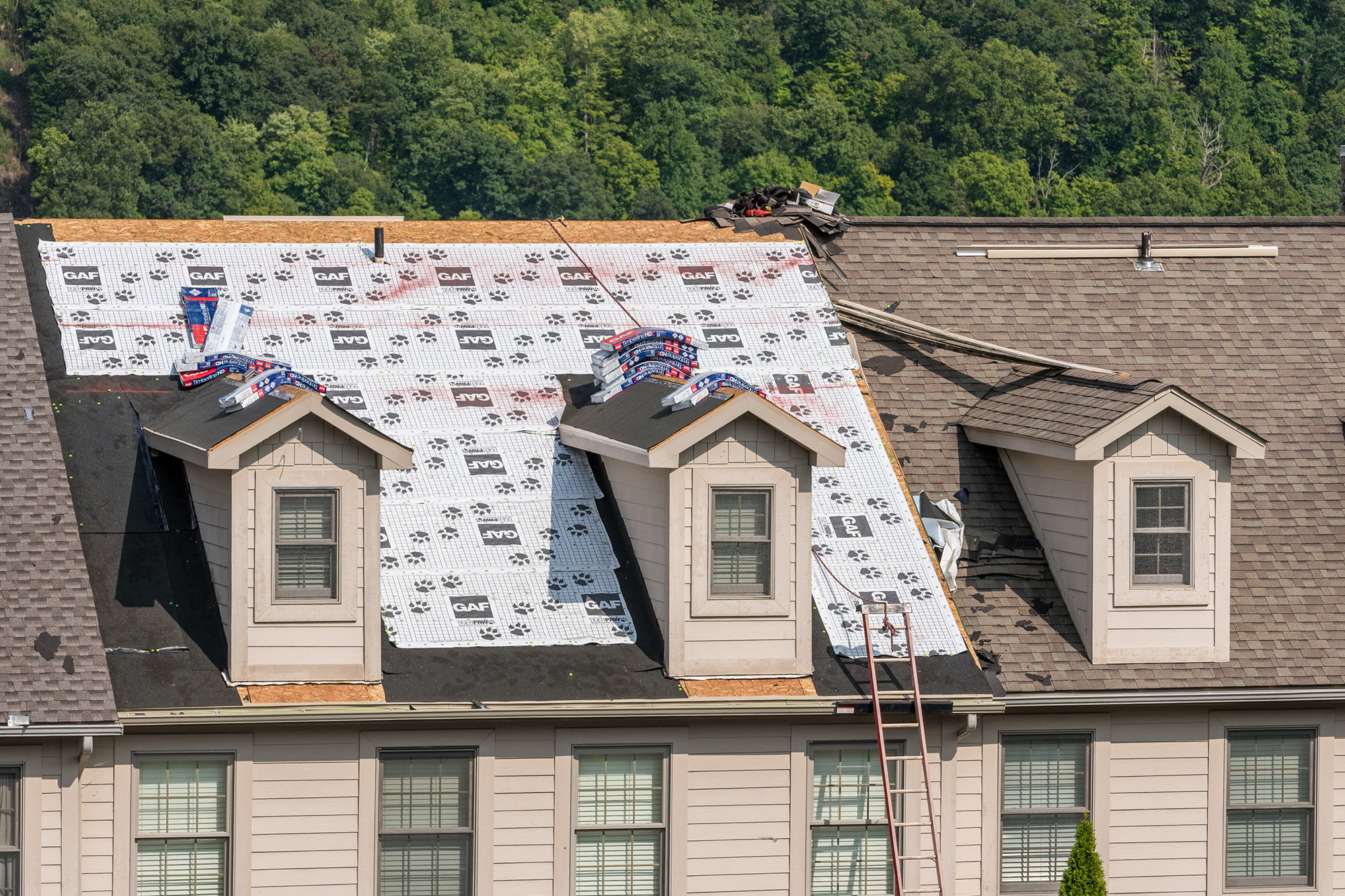 Roof replacement in progress | Nansemond River Roofing & Siding